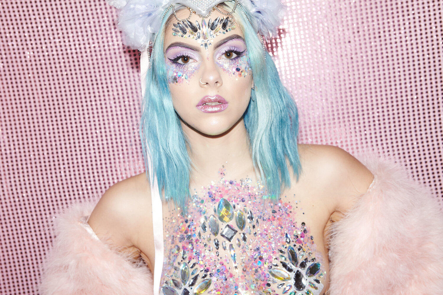 An image of blogger Sophie Hannah Richardson showing us her festival makeup with chunky glitter