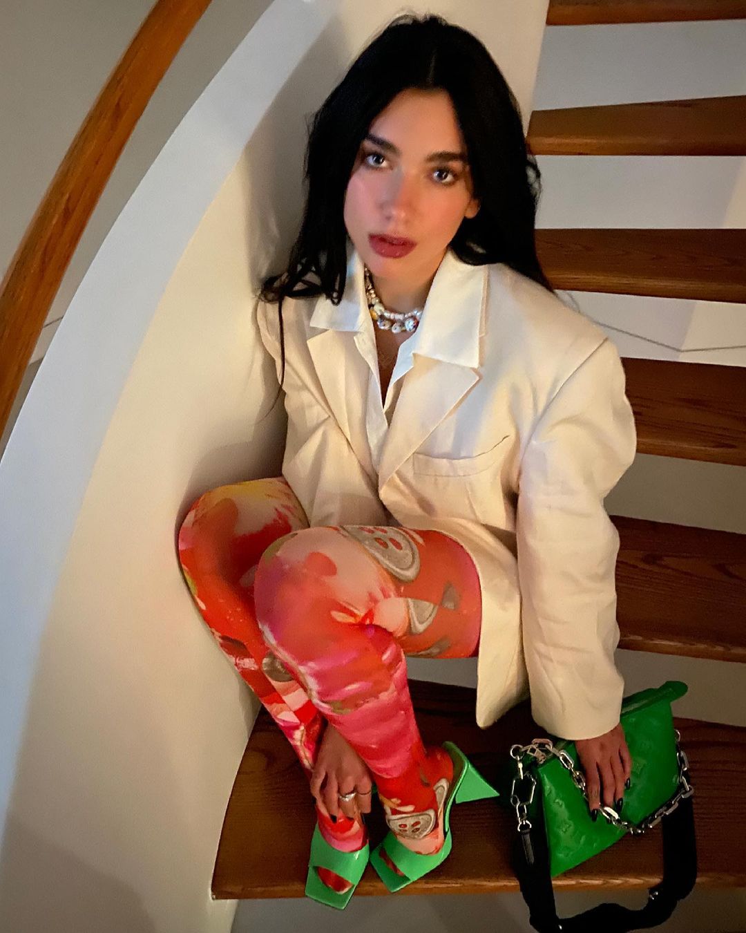 Dua Lipa wearing neon green heels - celebrity style steal