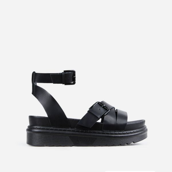 Puerto Cross Strap Buckle Detail Chunky Sole Platform Flat Gladiator Sandal In Black Faux Leather