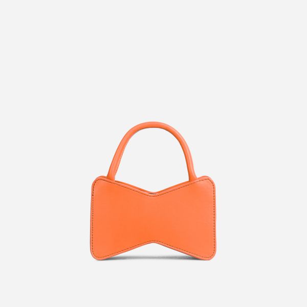 Reese Bow Shaped Top Handle Grab Bag In Orange Faux Leather