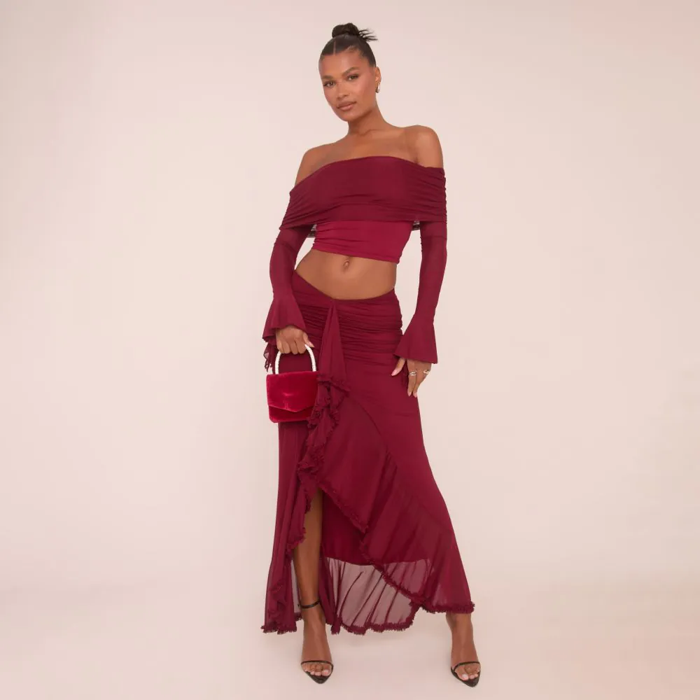 Long Flared Sleeve Fold Over Bardot Top And Dipped Waist Frill Detail Maxi Skirt Co-Ord Set In Burgundy Mesh